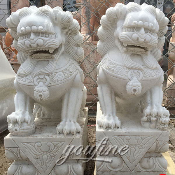 Outdoor guardian large marble foo dog statues  in front of house
